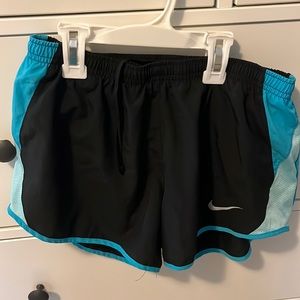 Black and blue Nike athletic shorts